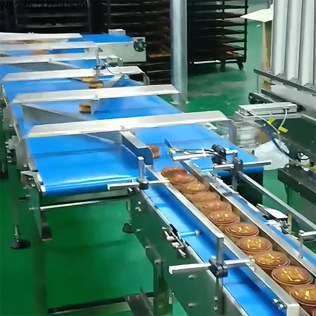 Transportador de Alimentación Automatizado para el Manejo y Alimentación de Productos de Panadería como Pasteles de Sésamo, Bizcochos de Melocotón y Pasteles de Luna