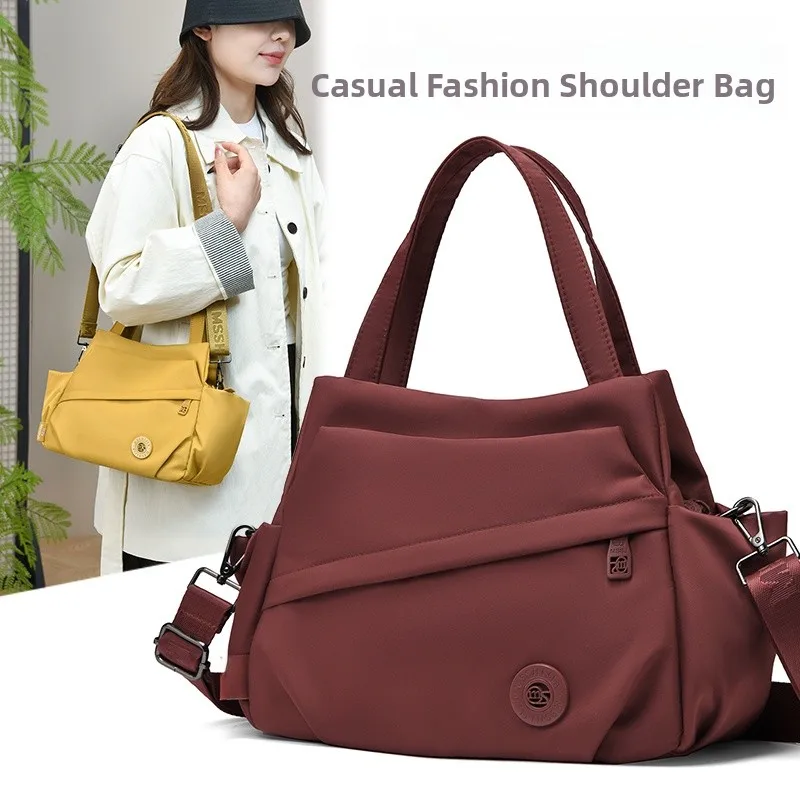 

Большая вместительная женская сумка через плечо из ткани Оксфорд, новинка 2026 года, простая универсальная сумка для поездок на работу, сумка для мамы