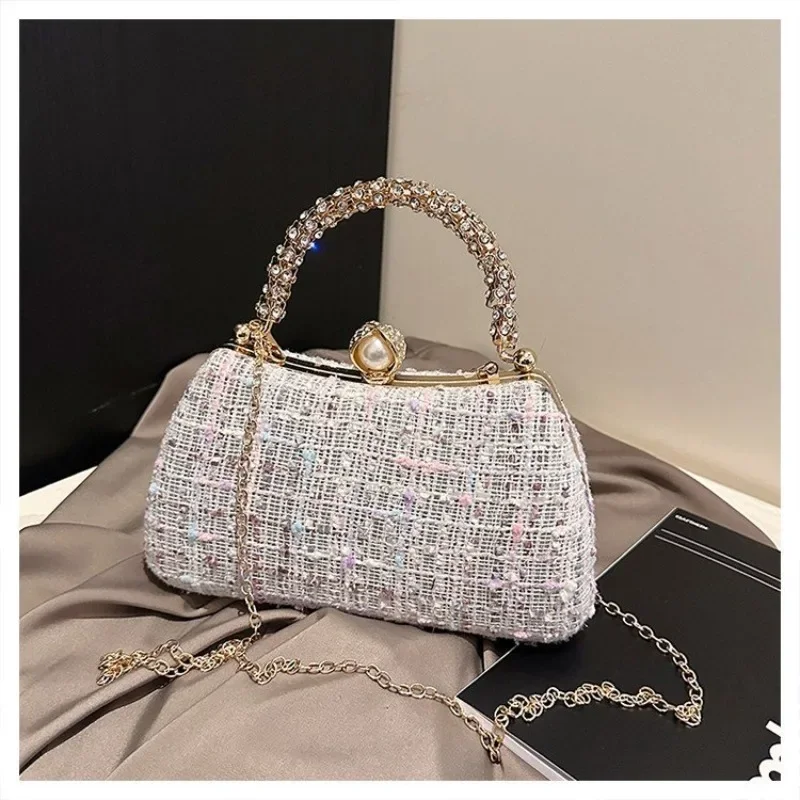シックでユニークなファッションデザイナーによる女性用おむつバッグ、高級レザーのクロスボディハンドバッグ、大容量でエレガントなトートメッセンジャー