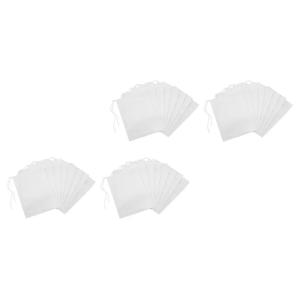 

200Pcs Disposable Tea Filter Bags White Non-Woven Loose Leaf Tea Holders Practical Infuser Drawstring Seal Bags