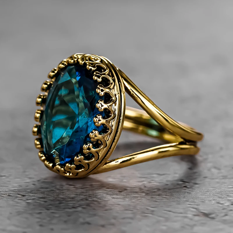 Huitan خمر خواتم الذهب اللون الفاخرة مع كبير الأزرق البيضاوي مكعب زركونيا للنساء حفل زفاف خطوبة اكسسوارات النبيلة