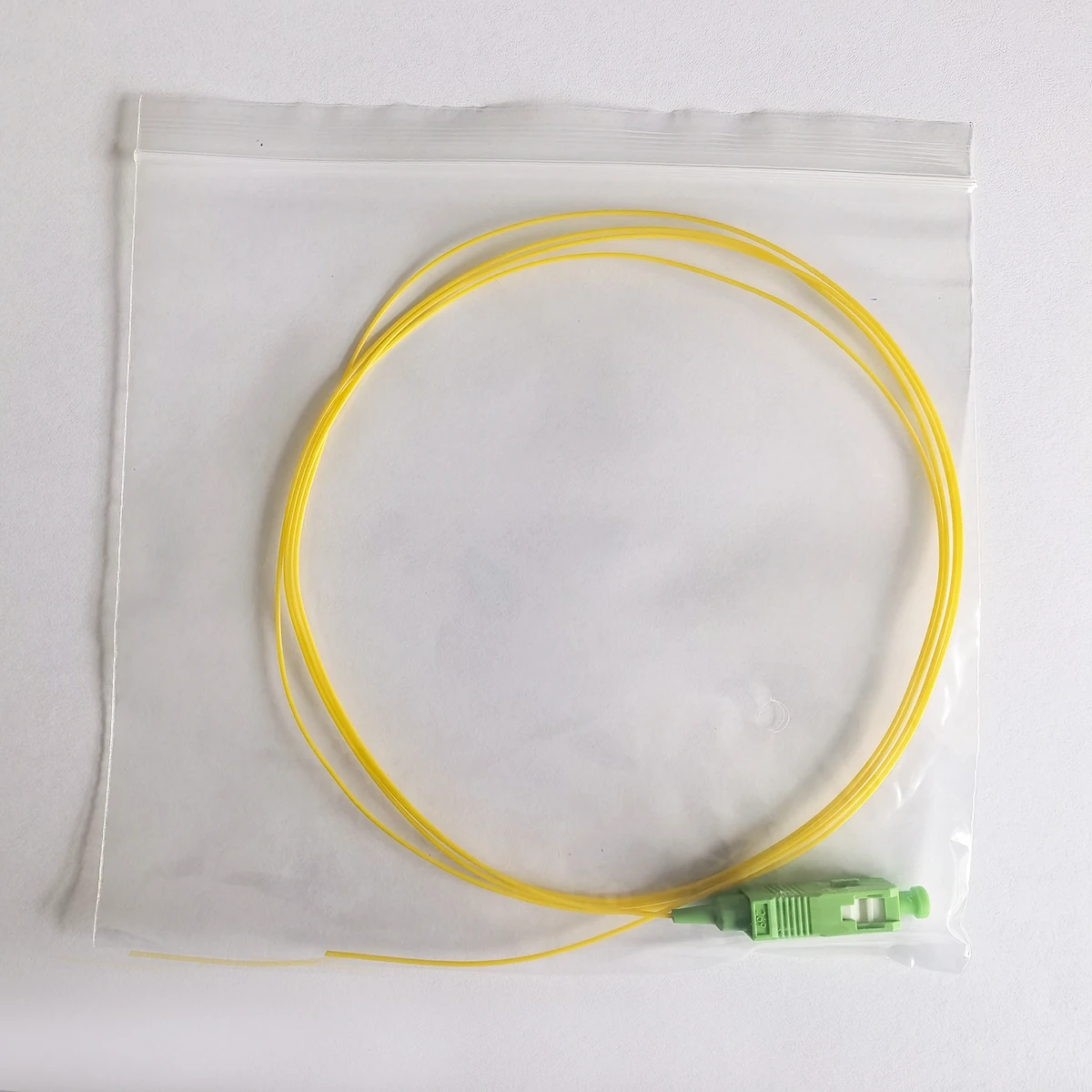 10/50 szt. światłowodowy pigtail SC/APC, jednomodowy, simplex, do użytku wewnątrz budynku, FTTH, 1M/1,5M/2M/3M, 9/125μm, średnica rdzenia 0,9 mm — zdjęcie produktu 7
