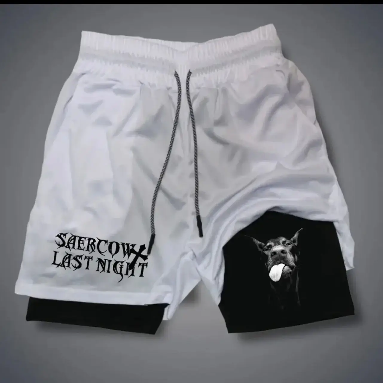 

White Mens Street Shorts with Saercow Last Night Print Black Inner Layer Doberman Dog Tongue Out Graphic Cross Design Elastic