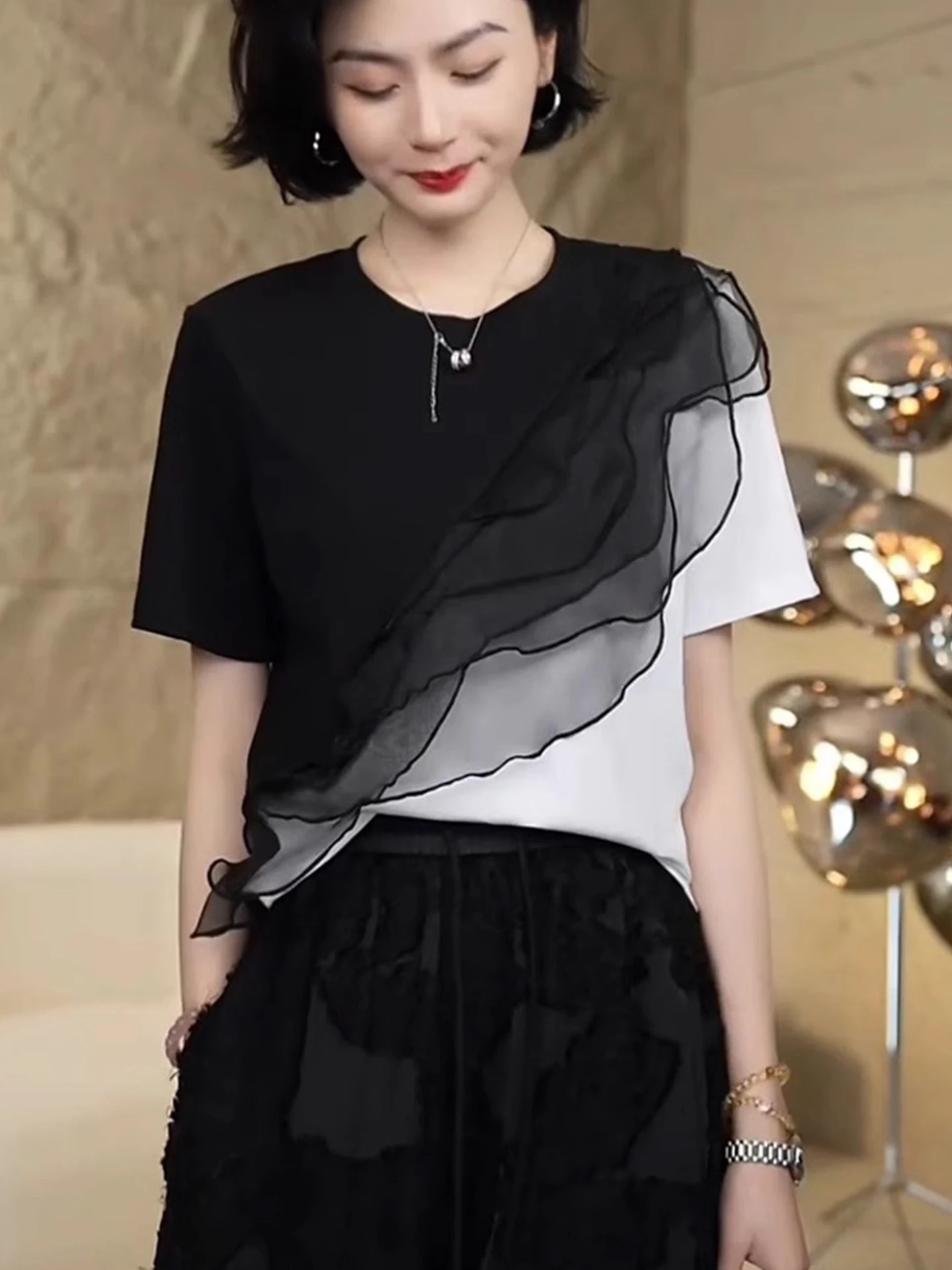 เสื้อยืดแฟชั่นผู้หญิงทรงหลวมสไตล์เกาหลีสำหรับฤดูร้อน