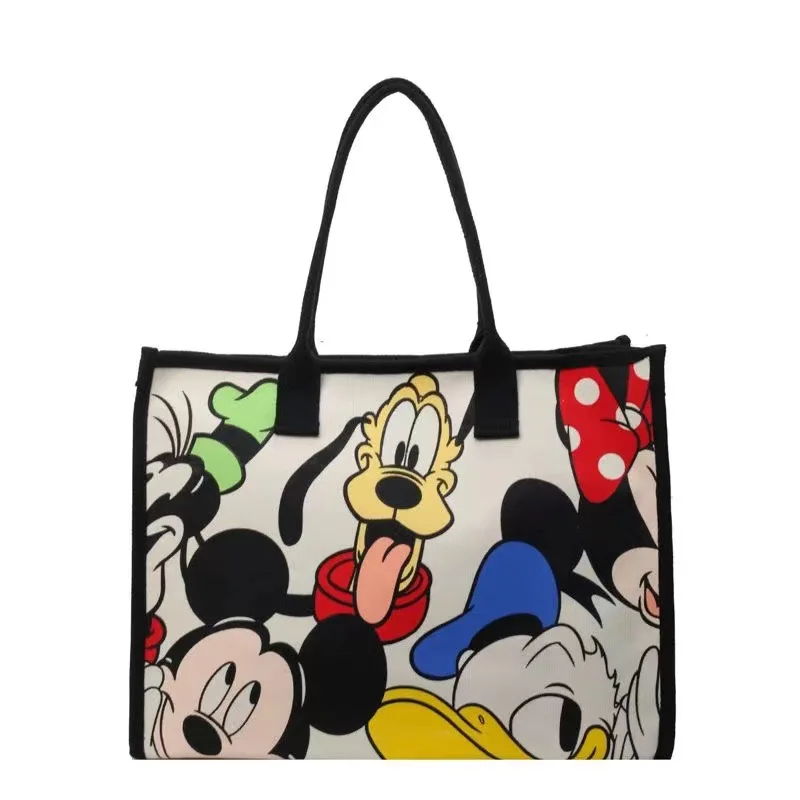 2025 New Disney Cartoon Animation Handheld Travel Shoulder Tote Bag Commuting Canvas Bag Female Mommy Bag Large Capacity Bag