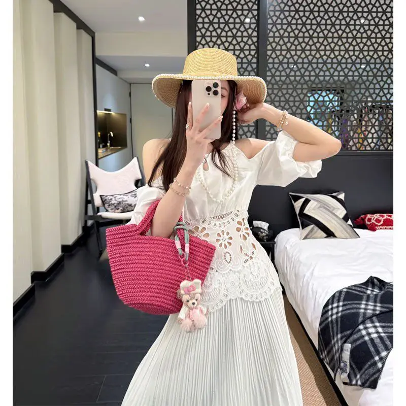 

French Light Luxury High-end Summer Wear A Complete Set of Feminine Celebrity Design Hollow Top Skirt Set Temperament Commuting