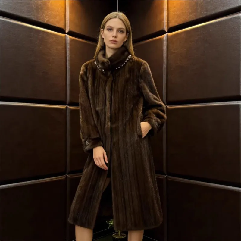 A long thick medium-textured warm three-dimensional fur coat for women