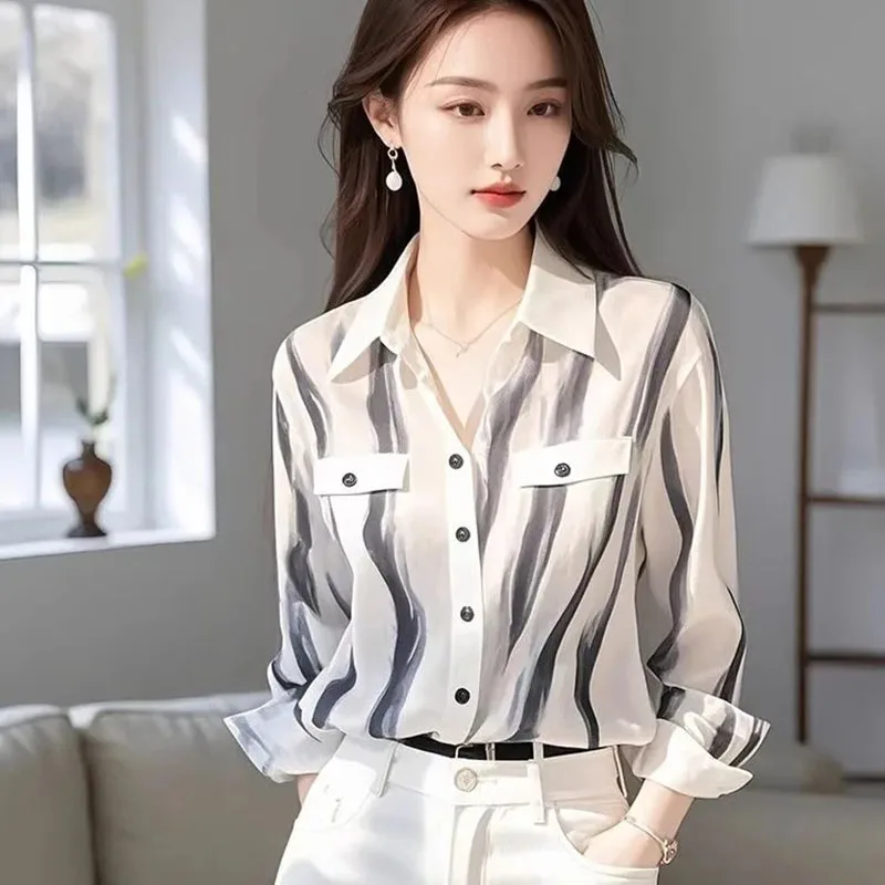 2025New Super Schöne Weiß Gestreiften Hemd Frauen Frühling Sommer Mantel Französisch Nische Chic Weibliche Top Dünne Beiläufige Schöne Bluse Damen