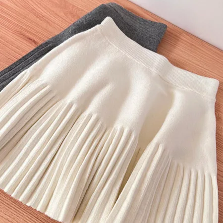 

High-quality elastic waist pleated women's short skirt, new high-waisted thin knitted one-word skirt in autumn and winter 2025
