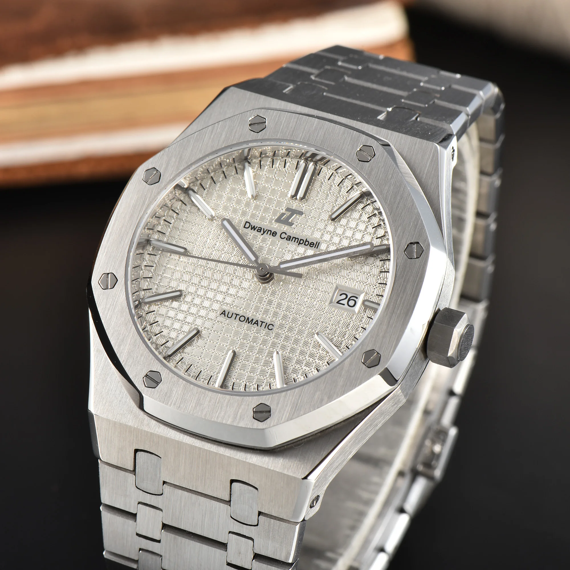 Fully automatic mechanical watch with NH35 movement, stainless steel strap, water-resistant, and sapphire glass watch face.