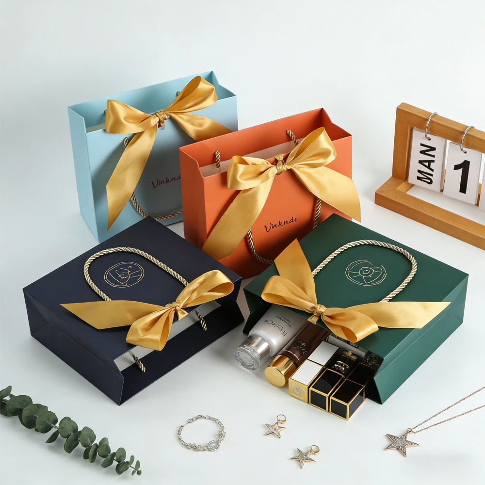 

100Pcs Custom Logo Paper Jewelry Tote Bag Wedding Favor Bags with Bow Gold Ribbon Handle Bulk for Shopping Party Bridesmaid