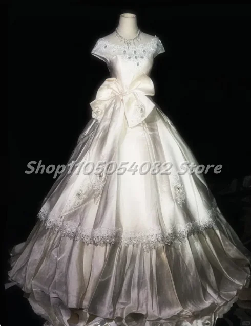 Customized Elegant and Luxurious Round Neck Wedding Dress Short Sleeves Lace Trimmed Gemstone A-line and Hemline Wedding Dress