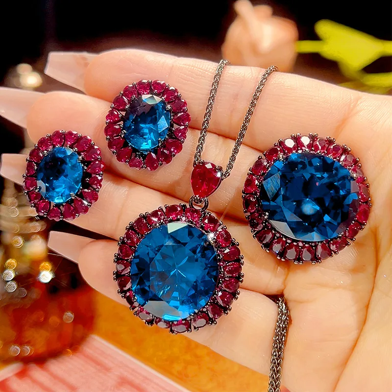 

Luxury Oval Blue Topaz Ruby Red Crystal Halo Jewelry Adjustable Ring Necklace Earrings Party Wedding Bridal Jewelry for Women