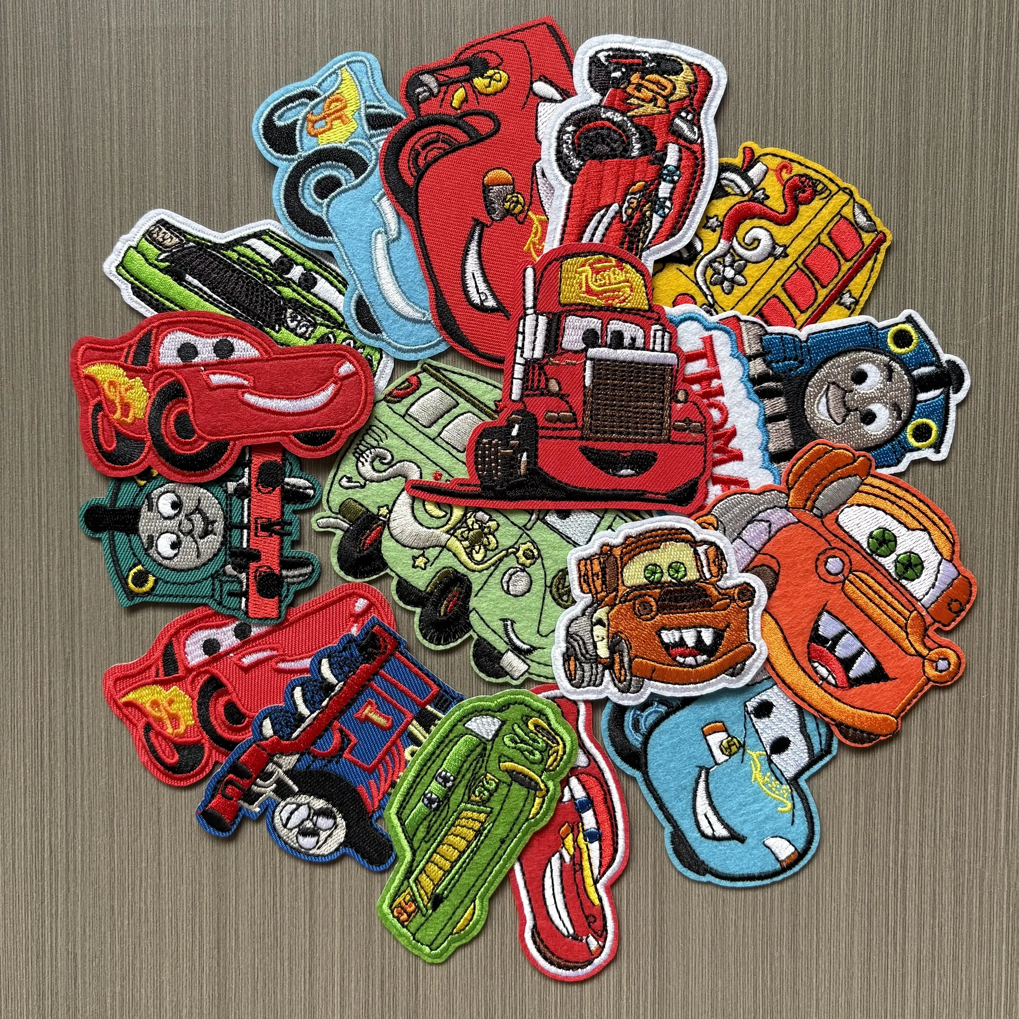 

17Pcs Anime Disney Animation Car For Sew on Clothes Stickers Sew Child clothing Iron on Adhesive Patches DIY Coat hat Applique