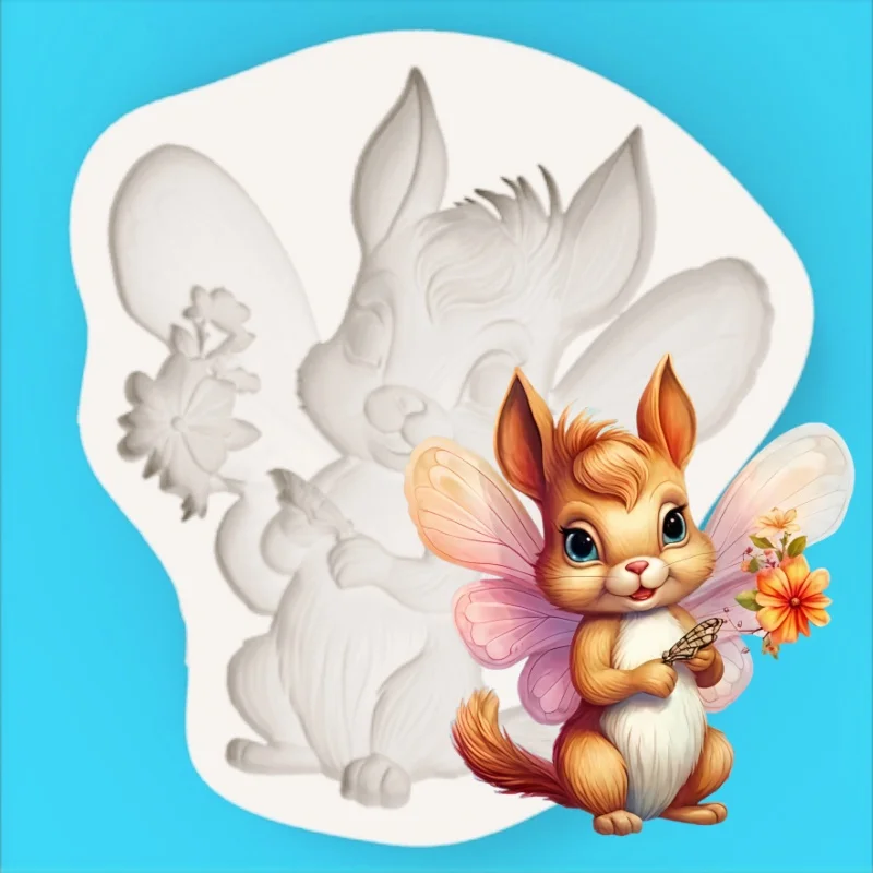 A Silicone Mold with Winged Squirrel, Flower, and Butterfly Elf Designs for Making Fondant Chocolate