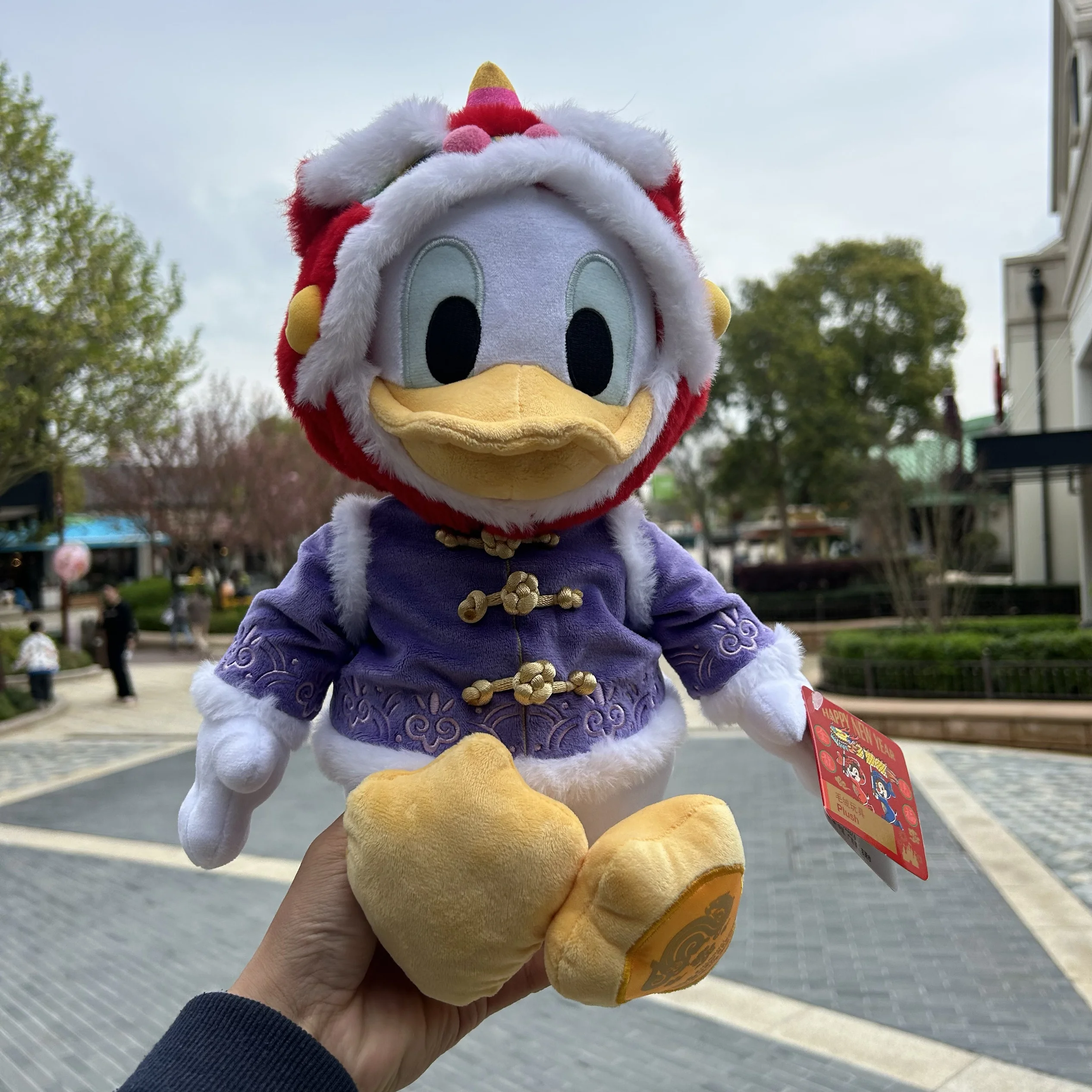 Shanghai Disneyland-juguete de peluche de pato Donald Edición Conmemorativa de Año Nuevo, muñeco, recuerdo, regalo para niños, 2024