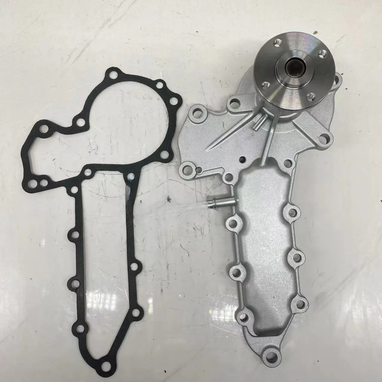 

z Machinery Engine Parts 1E017-73032 For Water Pump V2003T V2203 Engine Repair Parts For Kubota