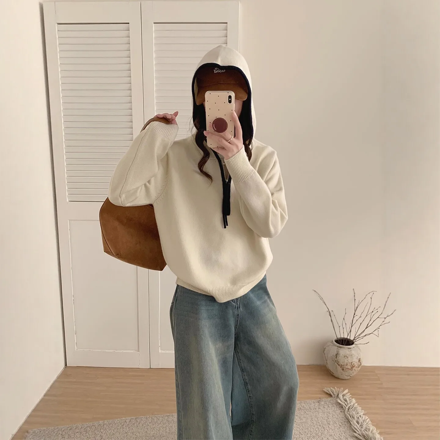 Thick hooded sweater in autumn and winter, women's explosions in winter, wearing lazy high-quality knitted bottoming shirt.