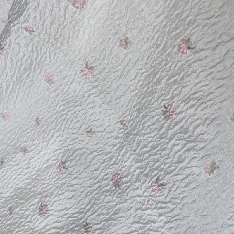 Semi-permeable foamed organza cut-cut jacquard fabric with embossed and small floral print dress made of