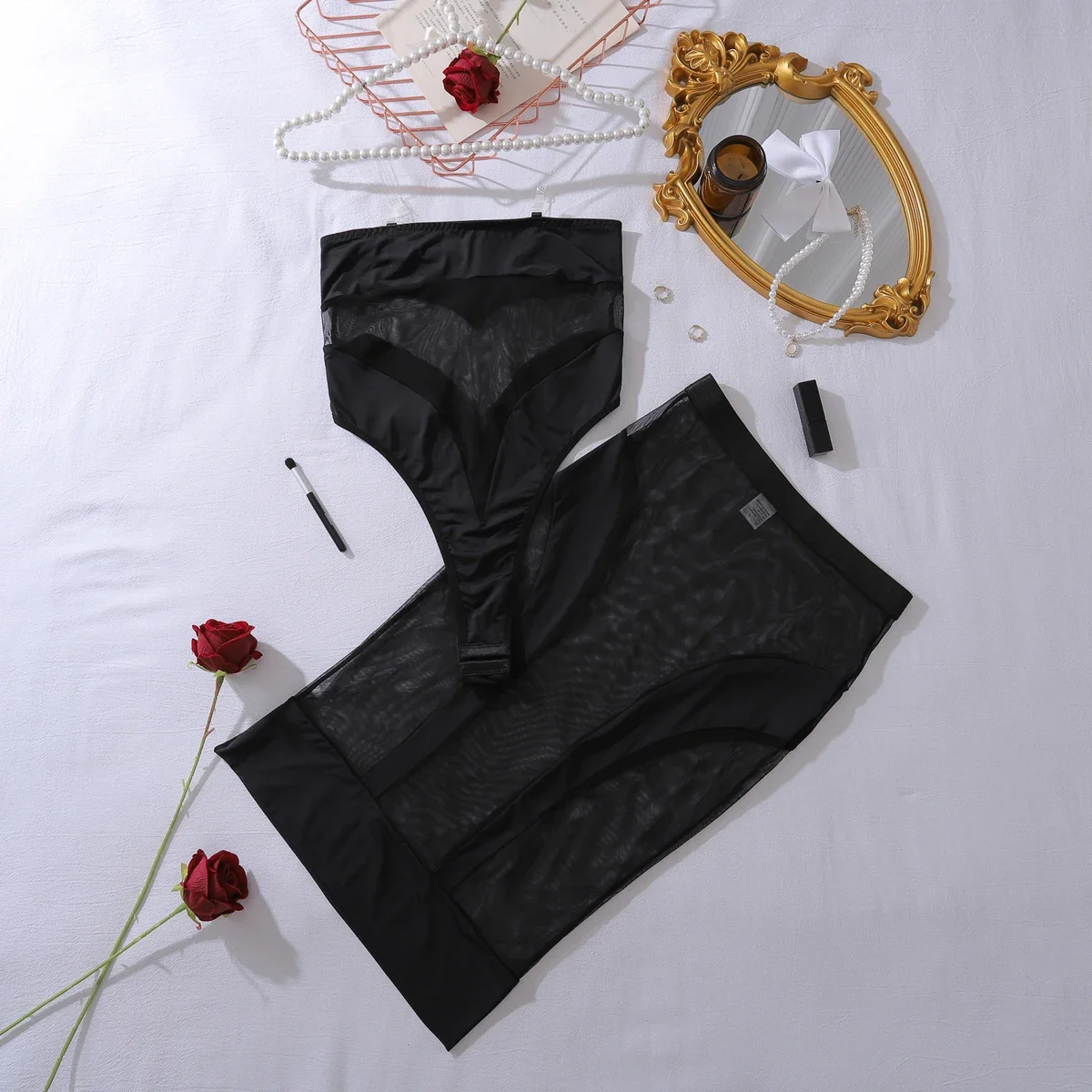 Conjunto de dos piezas de mono sexy de media falda de malla de retales ajustado con perspectiva europea y americana 2025