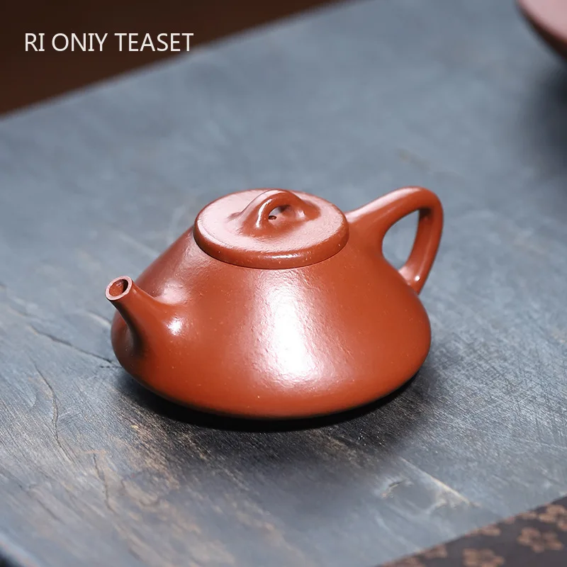 

100ml Chinese Yixing Purple Clay Teapot Kettle Beauty Tea Infuser Small Capacity Handmade Stone Scoop Tea Pot Zisha Tea Set