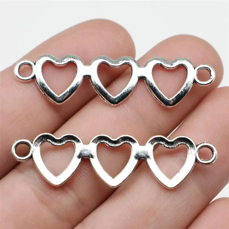150 Stück antiksilberfarbene Herzverbinder 43 x 11 mm für DIY-Schlüsselanhänger, Halsketten, Armbänder, Schmuckherstellung im Großhandel – Detail 2