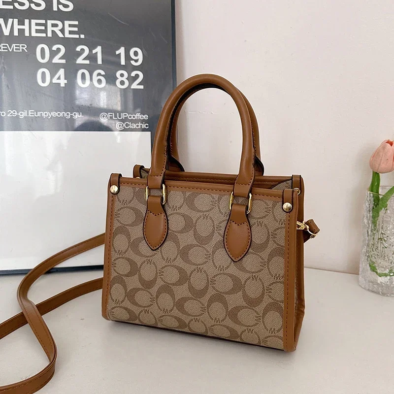 

Luxury Retro Messenger Bag For Ladies As A Shoulder And Crossbody Bag With Minimalist Look And Solid Color As A Chic Diaper Bag