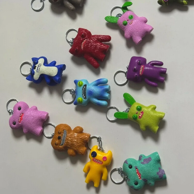 Fuggler genuíno bonito dente monstro série caixa cega brinquedos portáteis chaveiro pingente feio bonito na moda mini boneca saco ornamento presentes