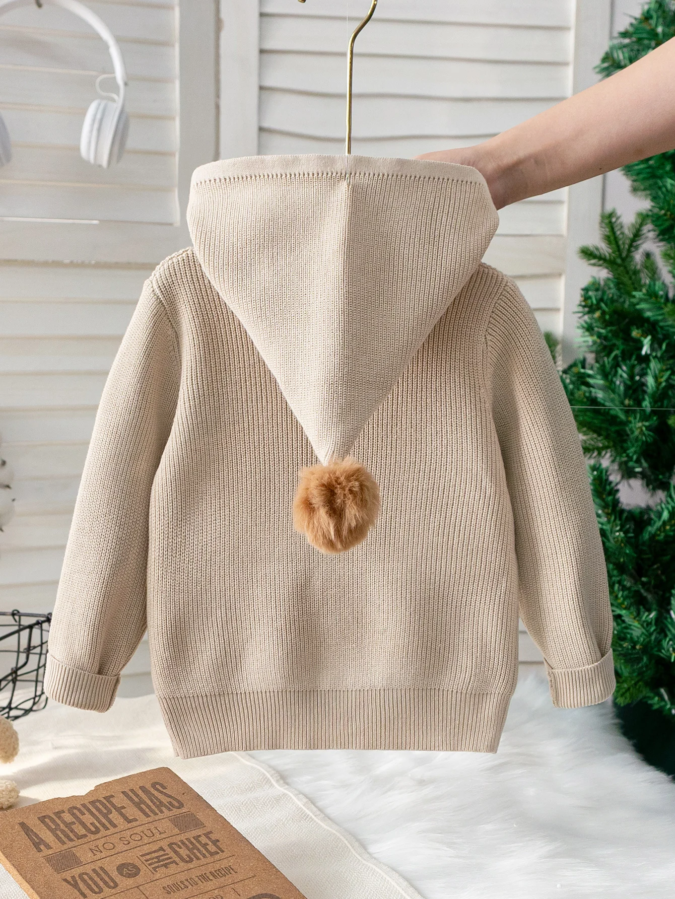 Baby boy's simple solid color hooded ball cardigan long sleeved sweater knitted suitable for daily leisure in autumn and winter