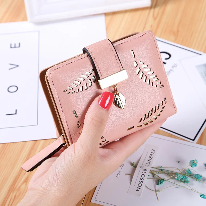 New Korean version of the short wallet lady zipper buckle hollow leaves small wallet wallet card package factory wholesale.