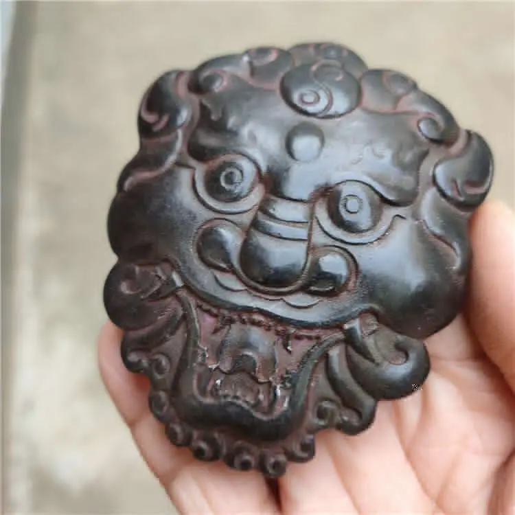 

China Iron Stone Hongshan Culture Red Mountain Old Jade Lion's Face Statue