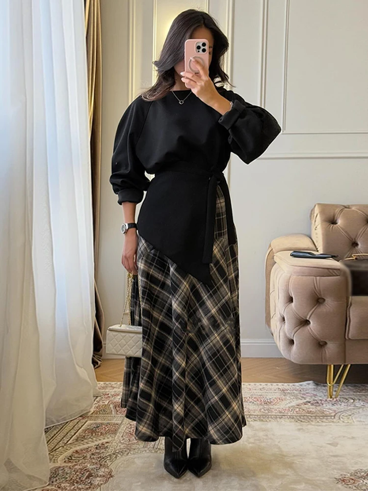 Komplety damskie w kratę: top z dekoltem okrągłym i podkreśloną talią oraz długa spódnica w kształcie litery A, nowa kolekcja wiosna 2026, codzienne ubrania damskie.