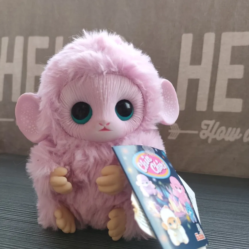 Weird fantasy creature plush monkey with a sticky face toy as a gift for friends for festivals or for collection.