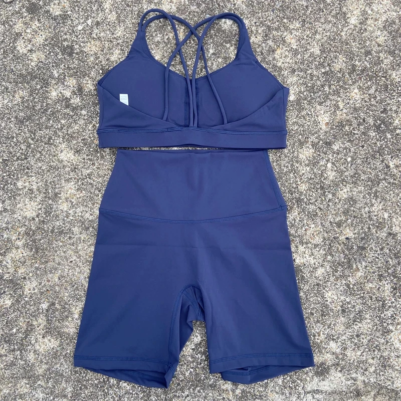 Conjunto de ciclismo corto para mujer, suave, de Color sólido, para gimnasio, Yoga, sujetador de gimnasio con espalda cruzada + Leggings cortos de cintura alta, ropa deportiva a prueba de golpes de alto impacto