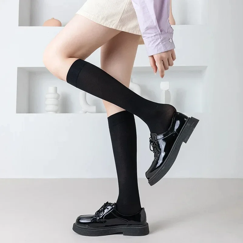 Calzini da donna JK tinta unita Calzini alti al ginocchio sottili Calzini lunghi Lolita bianchi neri carini Calze di nylon cosplay Kawaii per ragazze