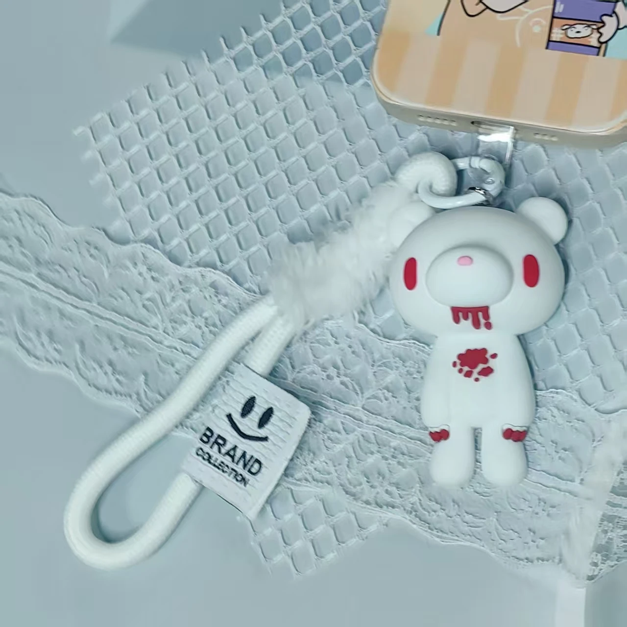 

These edgy bear keychains come in pink, white, black. With fluffy accents and bold designs, they add a cool vibe to keys/bags.