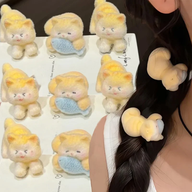 กิ๊บติดผมแมวน้อยน่ารักสีเหลืองครีมสไตล์เกาหลี น่ารัก กำนังกินปลา ตุ๊กตาขนนุ่ม หวานๆ สำหรับสาวๆ เครื่องประดับผมผู้หญิง