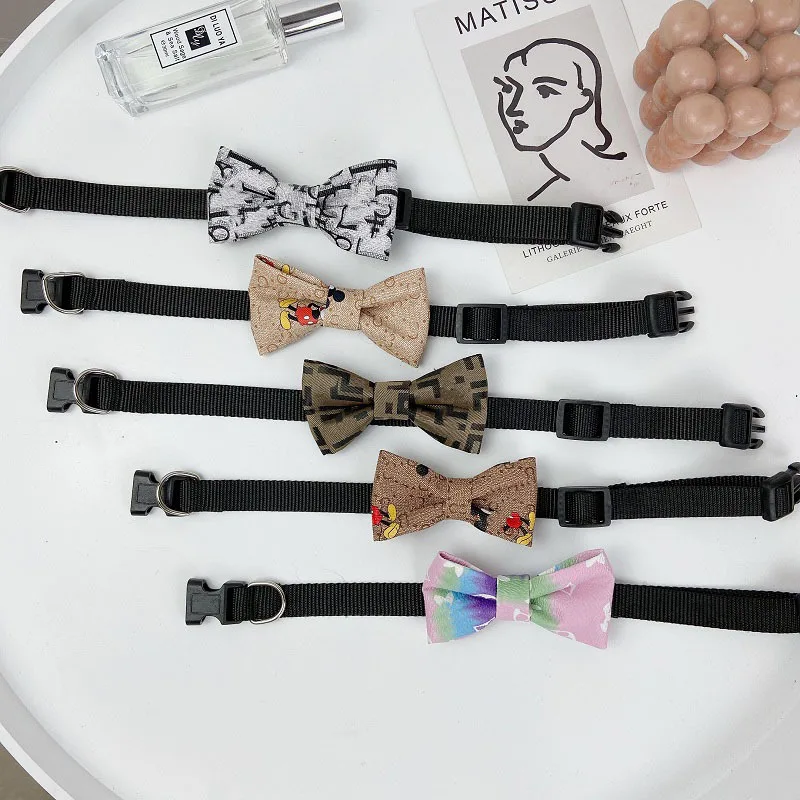 

Tide brand pet bow collar Teddy dog collar cat bow tie decoration can pull out the neck rope.