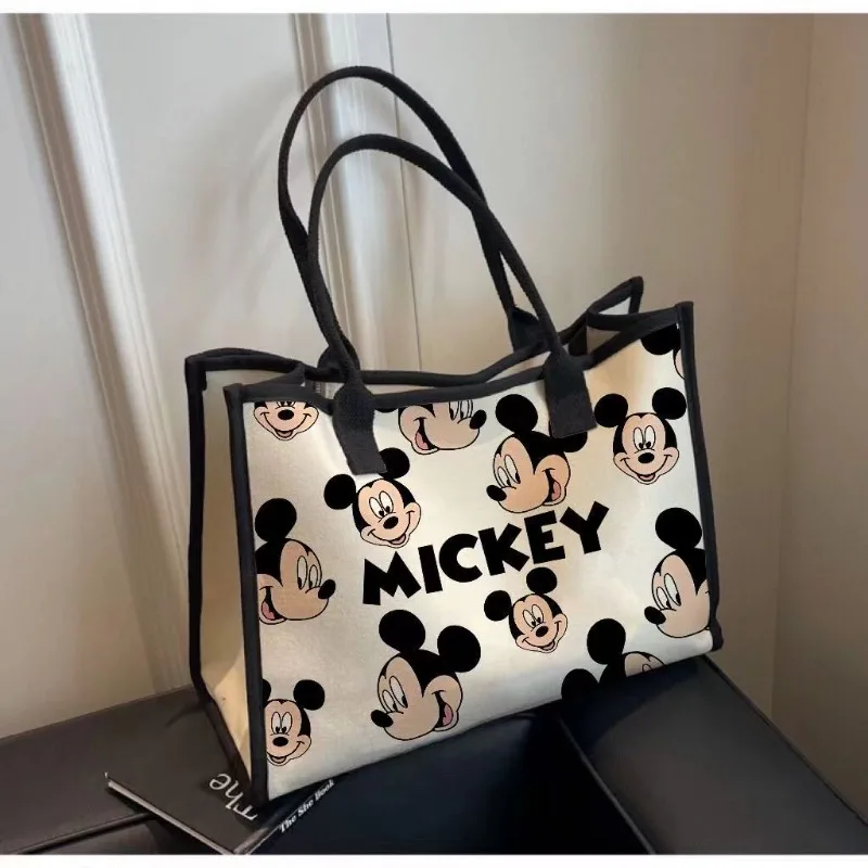 Disney New Large Capacity Cartoon Canvas Bag Women\'s 2024 New Fashion Outing Portable Shopping Bag Mommy Shoulder Tote Bag