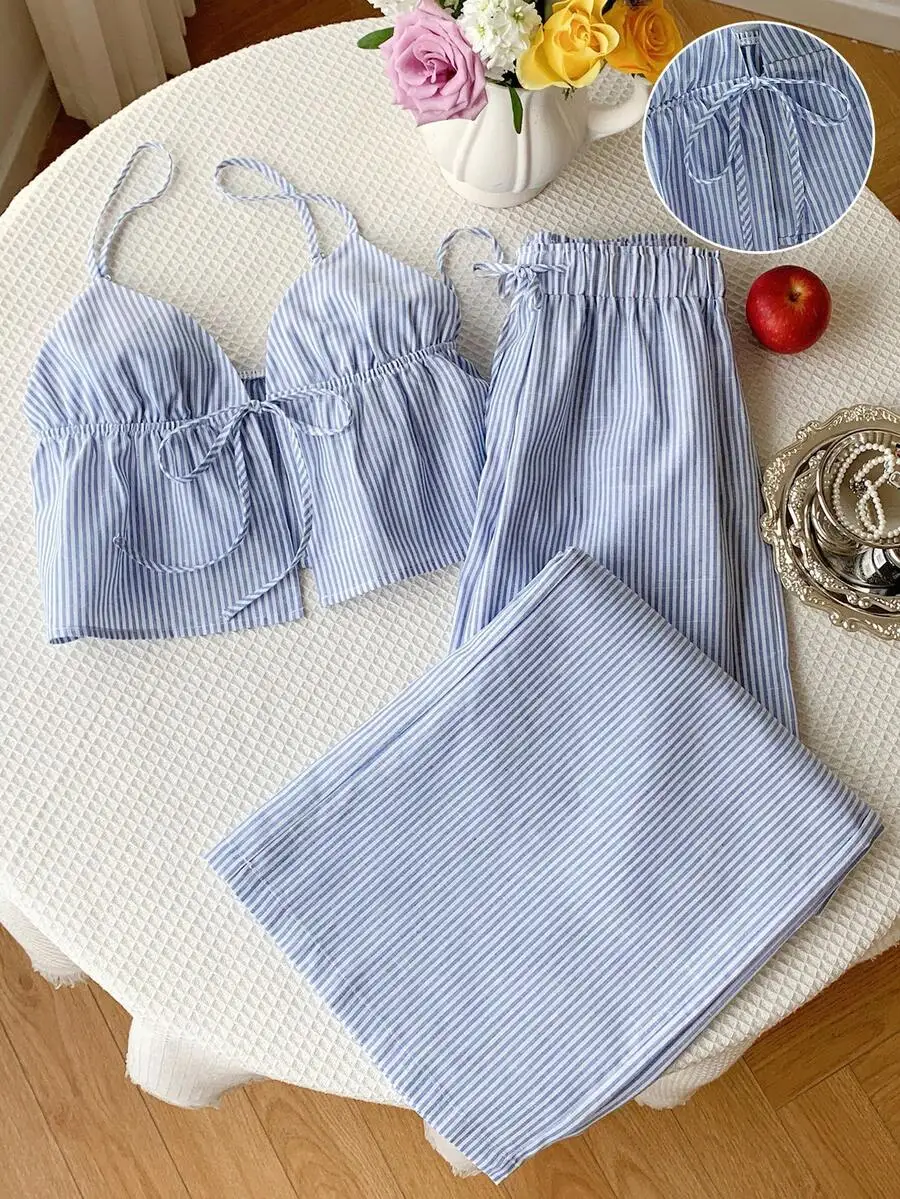 

Женский комплект для отдыха из двух предметов в сине-белую полоску: топ с завязками спереди и брюки с эластичным поясом