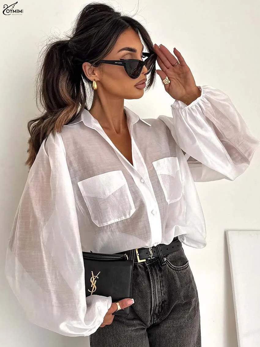 

Oymimi Elegant White Translucent Women's Blouse Fashion Turn Down Collar Long Sleeve Blouses Summer New Pockets Button Shirts