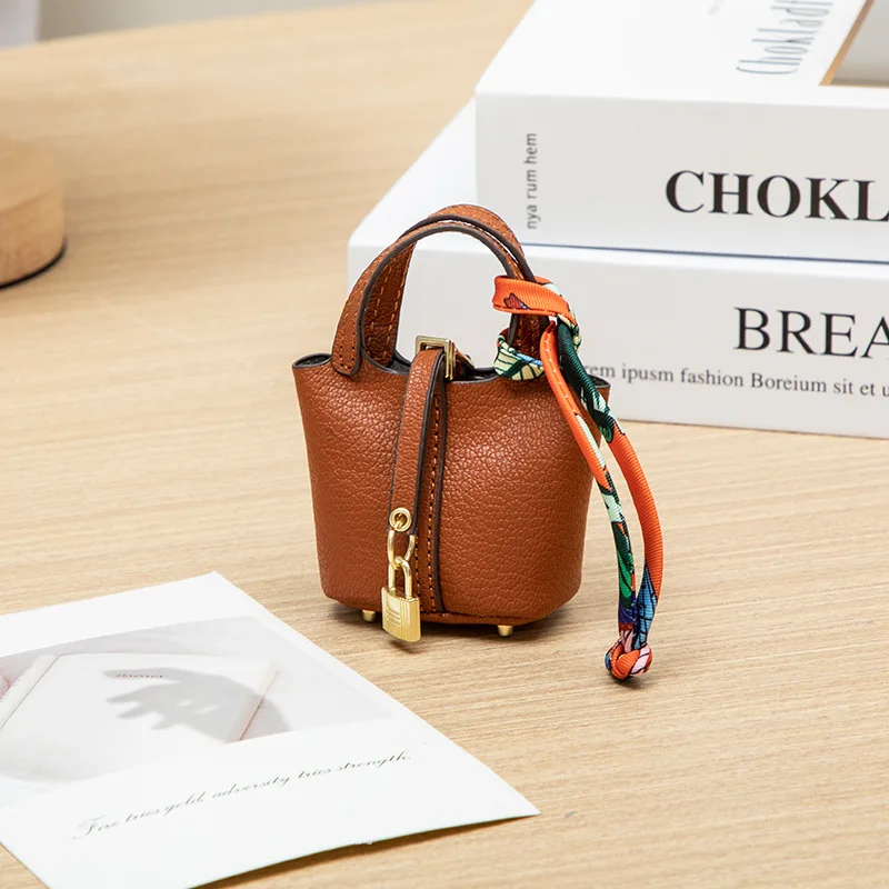 2026 Mini-Taschenanhänger Schlüsselanhänger Hängeaccessoire Zero Wallet Kreatives tragbares Armband Bluetooth-Kopfhörertasche Multifunktional – Detail 16