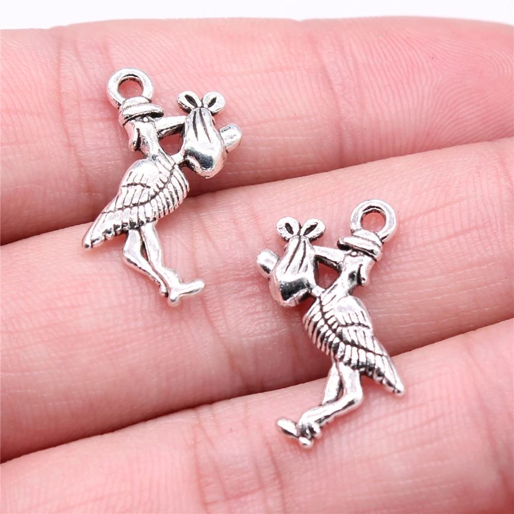 WYSIWYG 10 sztuk 23x18mm nowe dziecko bocian Metal Charm bocian dziecko ptak Charms w stylu Vintage DIY akcesoria do tworzenia biżuterii
