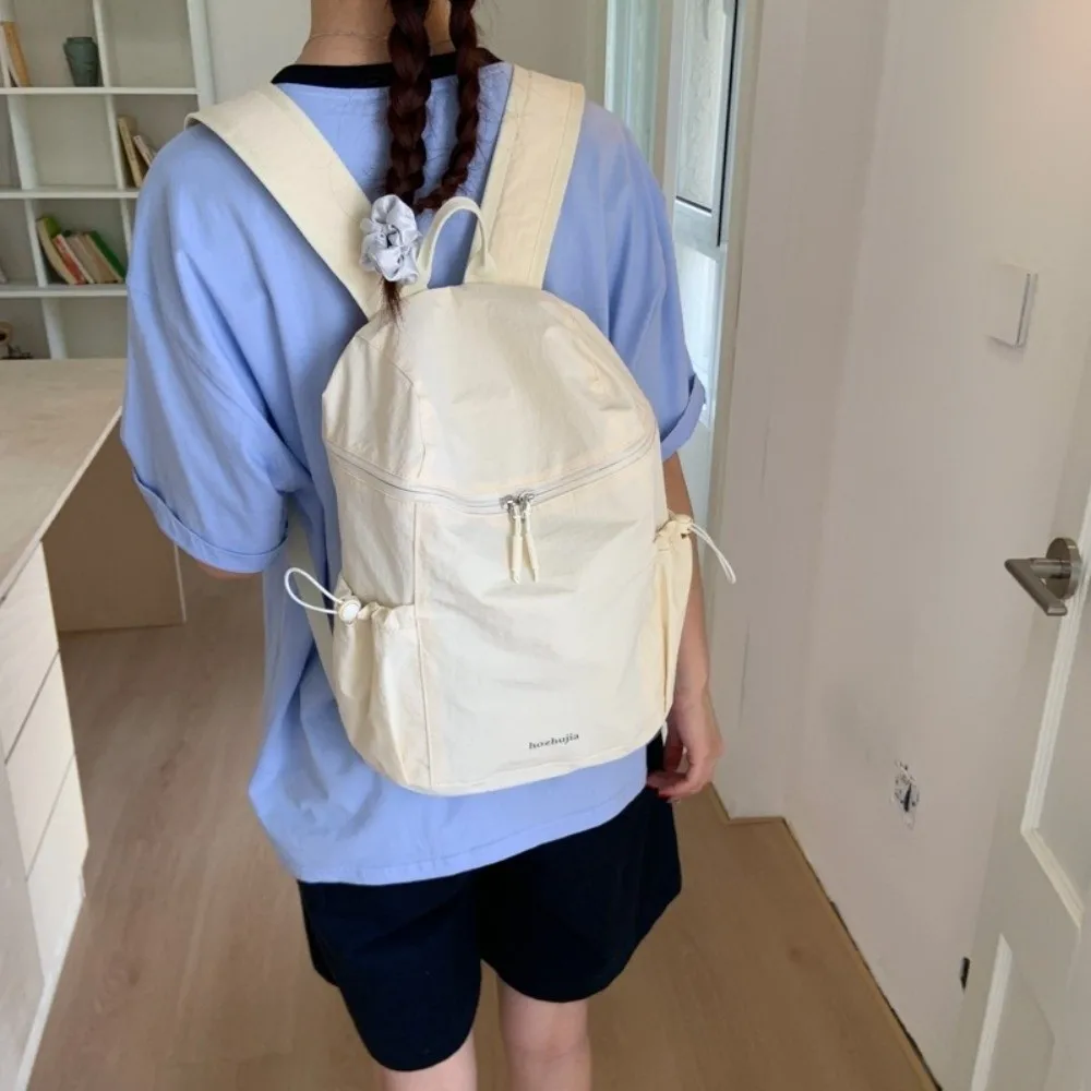 

Casual Korean Lightweight Backpack Solid Color Leisure Nylon Shoulder Bags Large Capacity College Student Schoolbag Unisex