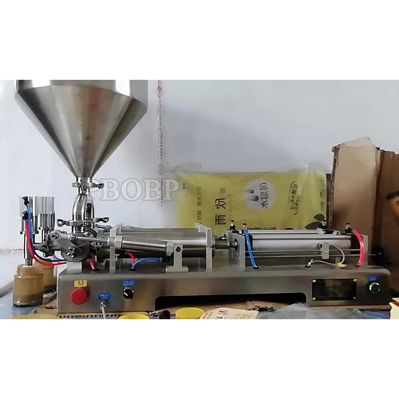Máquina de llenado de botellas de vidrio y plástico semiautomática para miel, crema, cosméticos, mantequilla de cacahuete y jarabe, con tarifas incluidas para empresas.