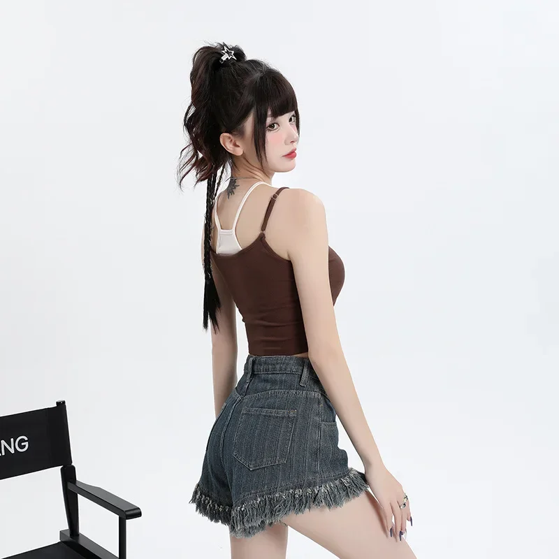 レトロなフリンジデザインの立体的な自己修養ハイウエストデニムショートパンツ。 女性のための夏のファッションカジュアルデニムショートパンツ