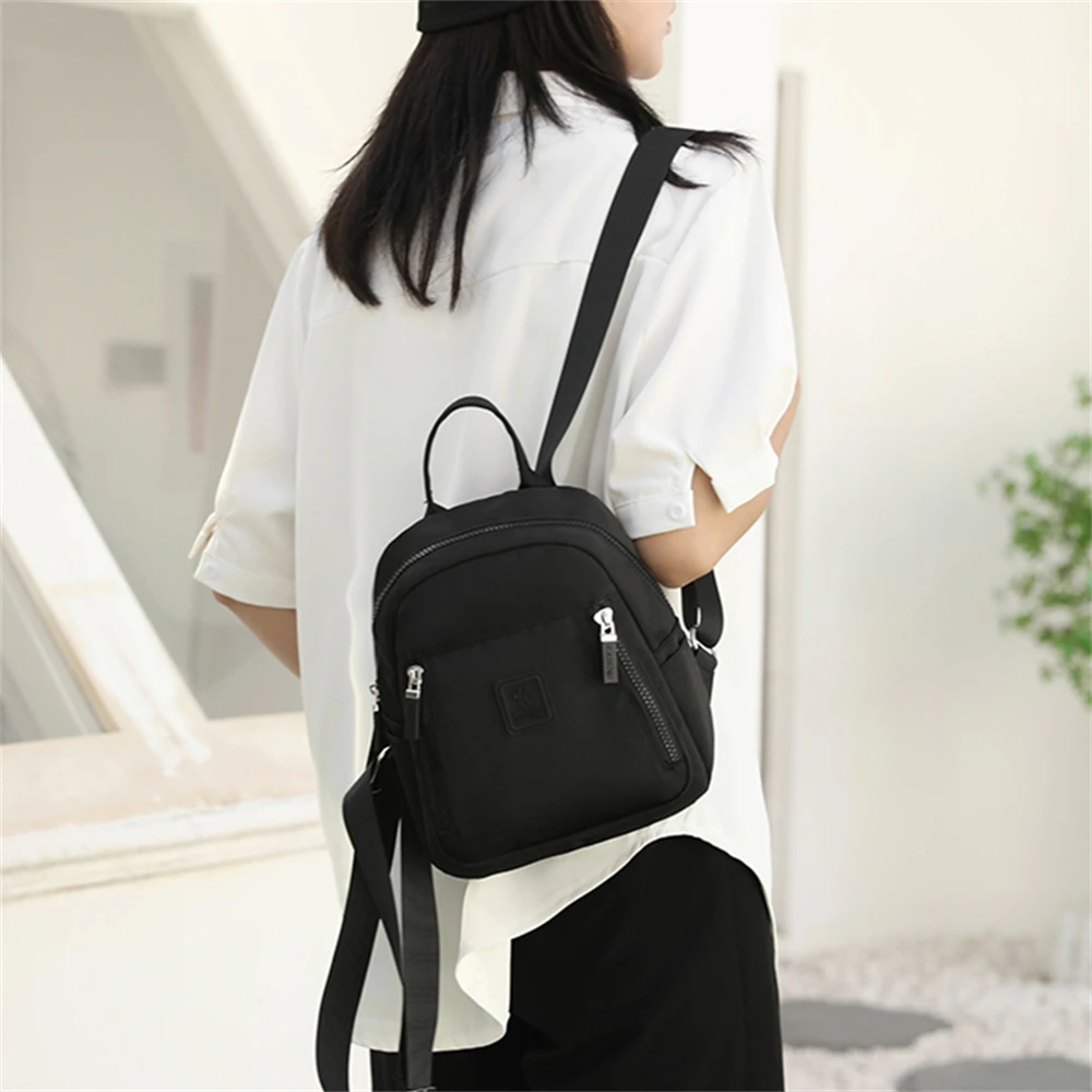 New Small Ladies Backpack Solid Color High Quality Nylon Women's Travel Backpack Fashion New Ladies Shoulder Bag Bolsos De Mujer