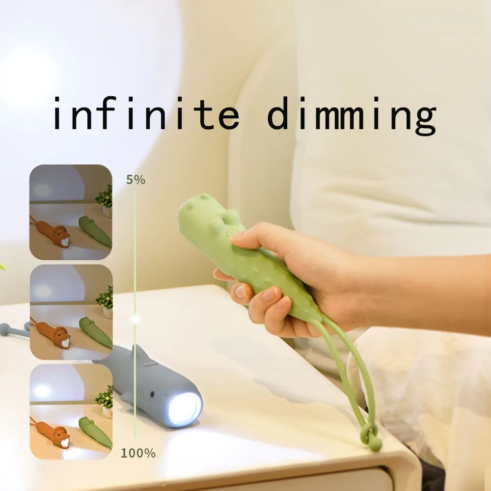 

Outdoor portable silicone flashlight cartoon shaped emergency night light long-range shooting