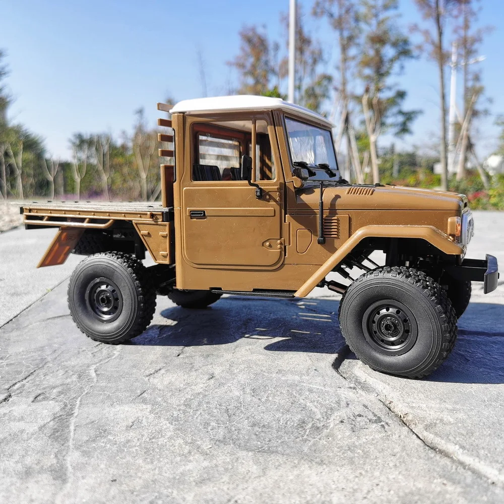 Wpl C-44 مقياس كامل 2.4 جرام Rc شاحنة صحراوية دلو خلفي Rtr ألعاب التحكم عن بعد سيارات للأولاد تسلق عربات التي تجرها الدواب نموذج محاكاة