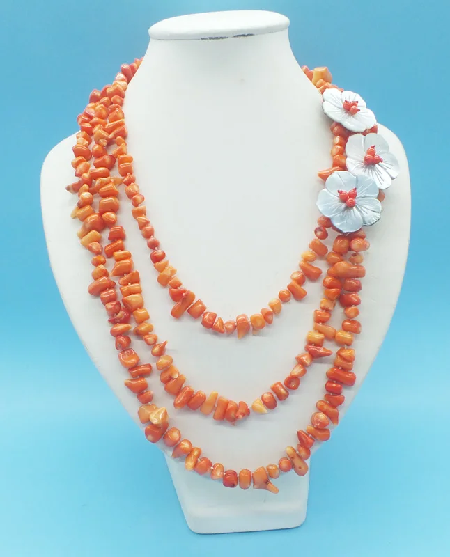 

3 shares. Natural irregular coral necklace 19-23"